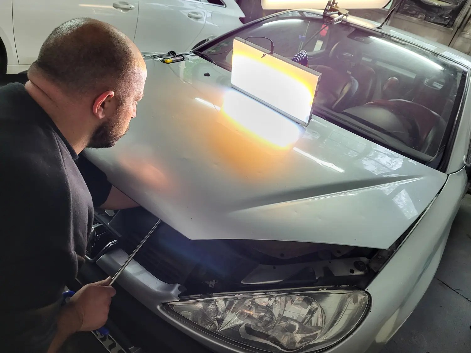 Herausforderungen meistern von AT Dellentechnik